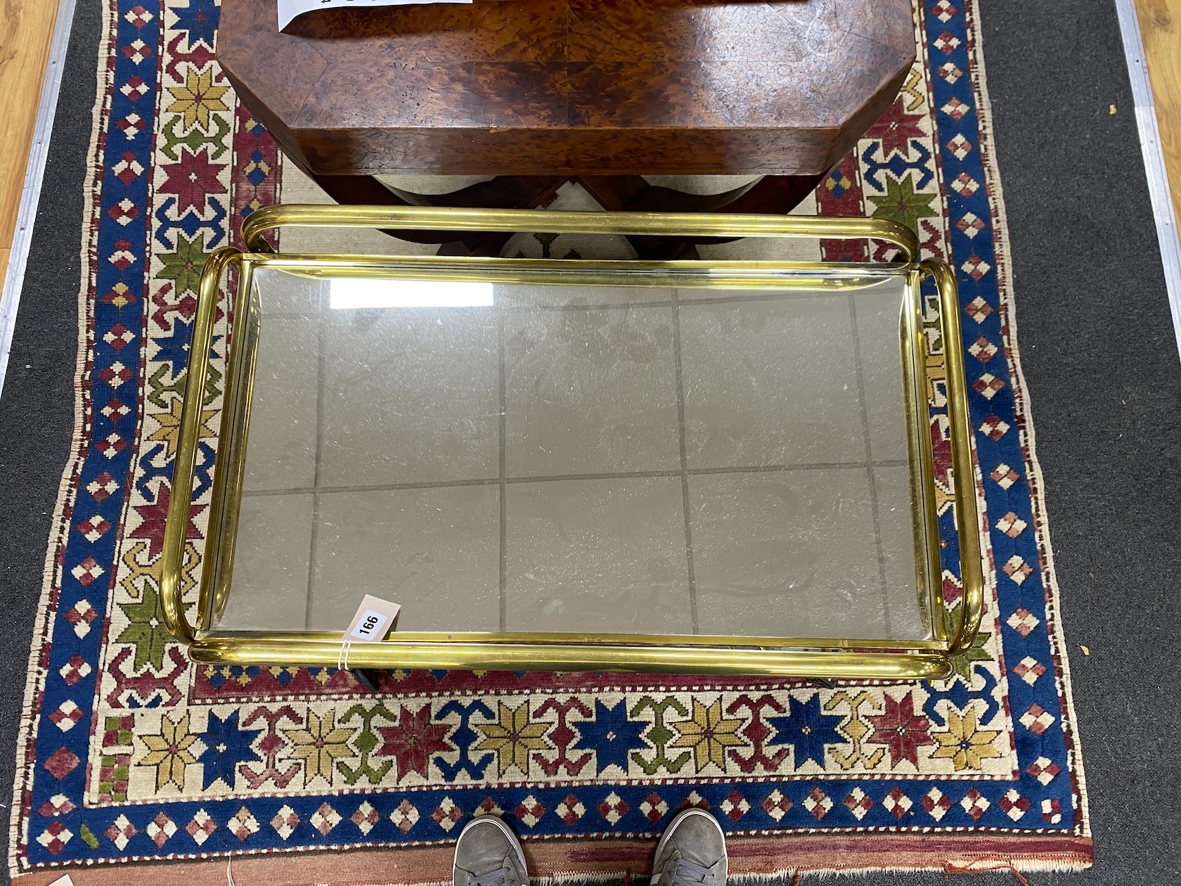 An Art Deco style mirrored brass two tier trolley width 73cm, depth 44cm, height 68cm